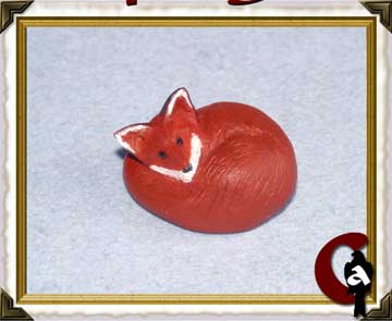 Miniature - sleeping fox
